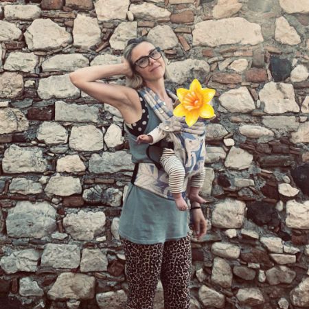 Sophia Di Martino's baby face has been covered with flower emoji.
